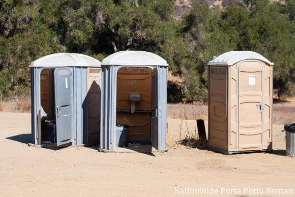 a clean row of portable restrooms for outdoor weddings or festivals in Oaklyn, NJ